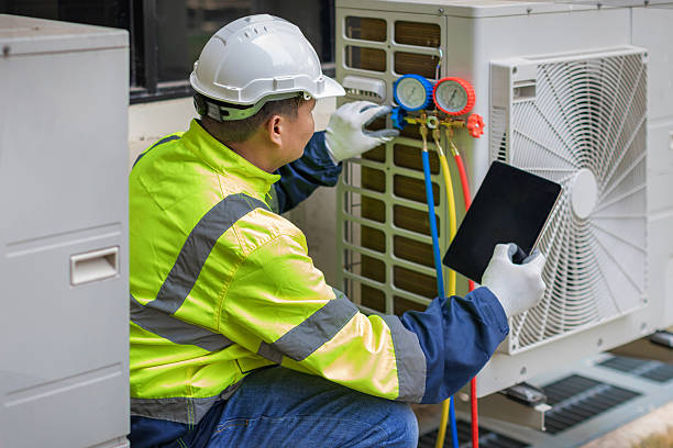 Professional Heat Pump Repair technician working in Overpeck, OH